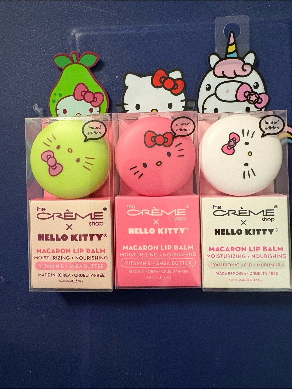 The Crème x Hello Kitty Macaron Lip Balm Trio - green, Pink, White